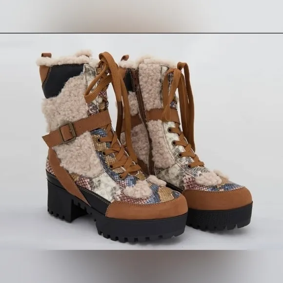 SNAKESKIN print with brown trim, sherpa lined interior, platform boot
