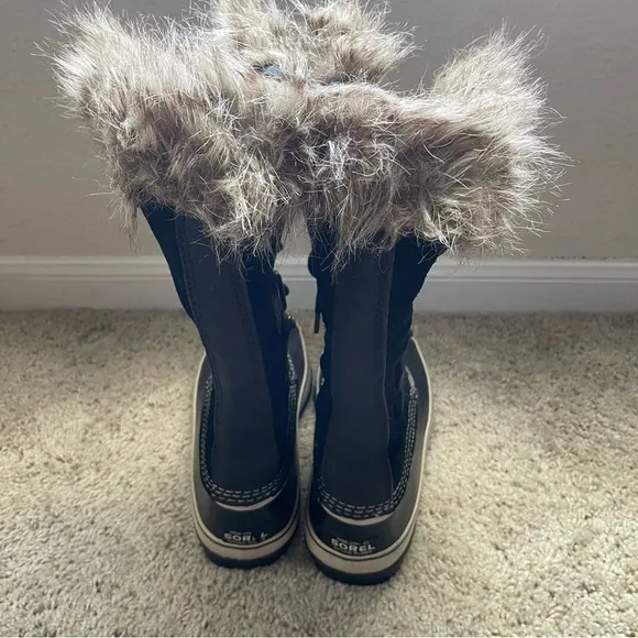 Sorel women black leather/suede/and rubber snow boots, size 11