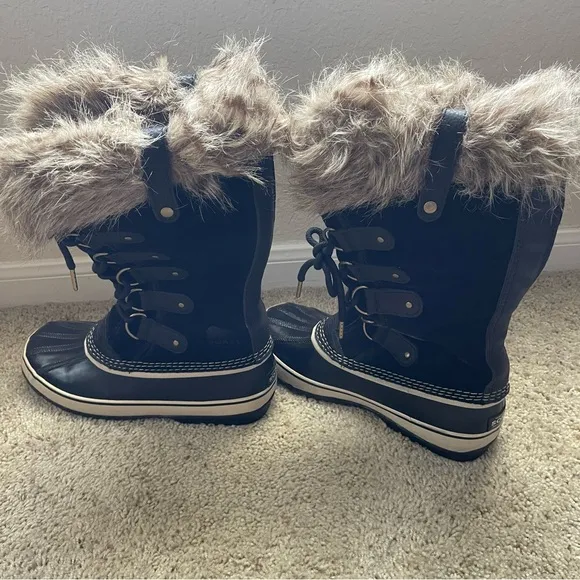 Sorel women black leather/suede/and rubber snow boots, size 11
