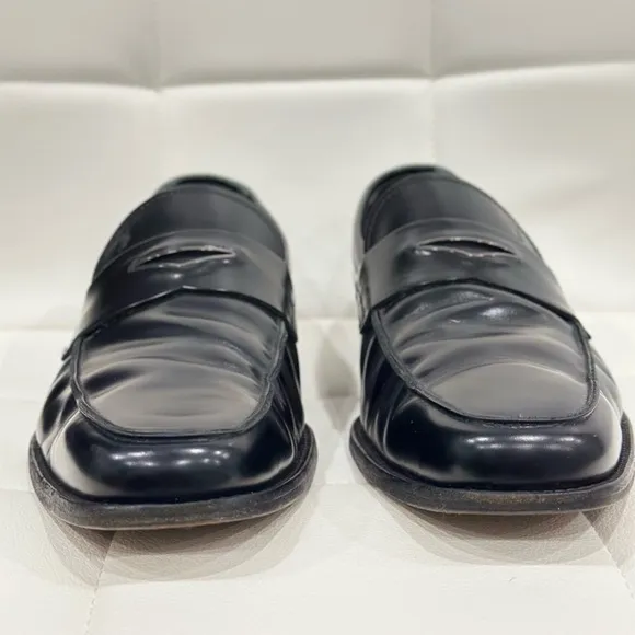 Tod's Black Leather Penny Loafers