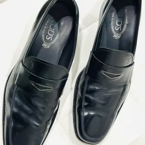 Tod's Black Leather Penny Loafers