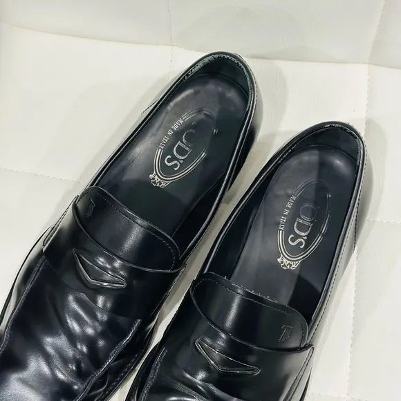 Tod's Black Leather Penny Loafers