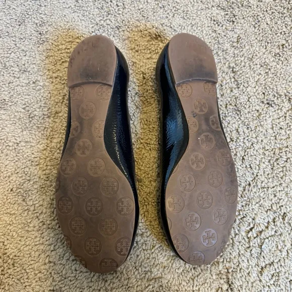 Tory Burch Black and Gold Leather Loafers with Signature Medallion