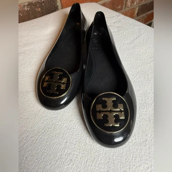Tory Burch waterproof PVC jelly Reva black with gold tone logo slip on flats