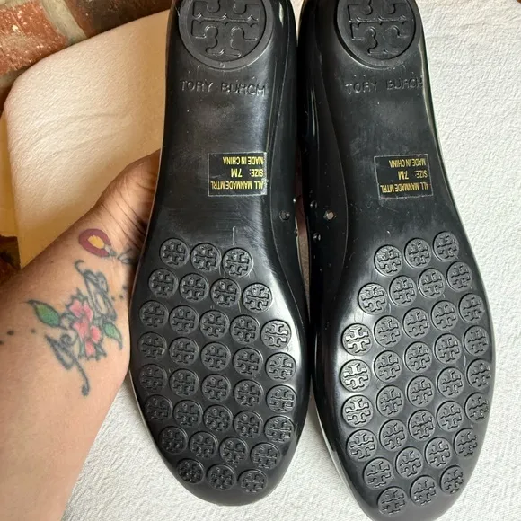 Tory Burch waterproof PVC jelly Reva black with gold tone logo slip on flats