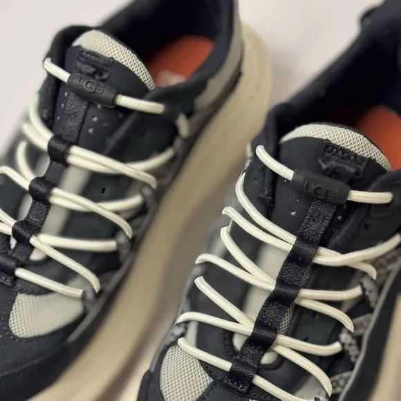 UGG BLACK/ WHITE CA805 V2 REMIX LEATHER SNEAKERS