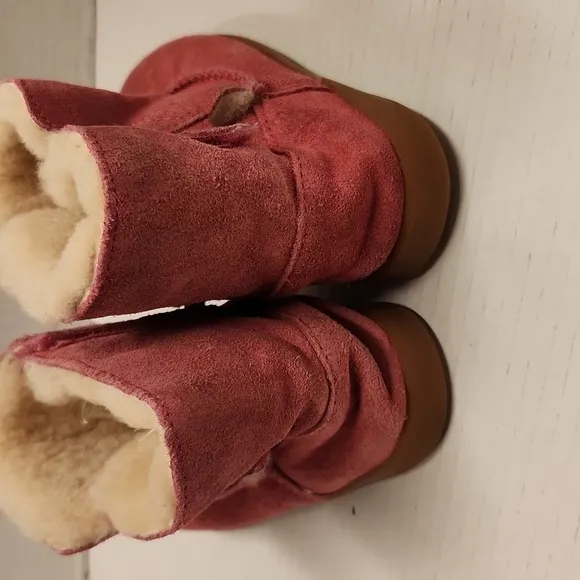 UGG boots pink faux fur lined size 10