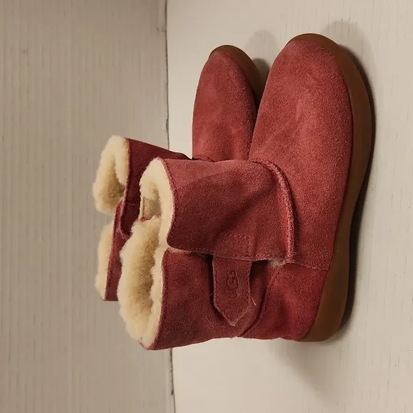 UGG boots pink faux fur lined size 10