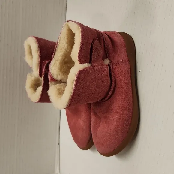UGG boots pink faux fur lined size 10