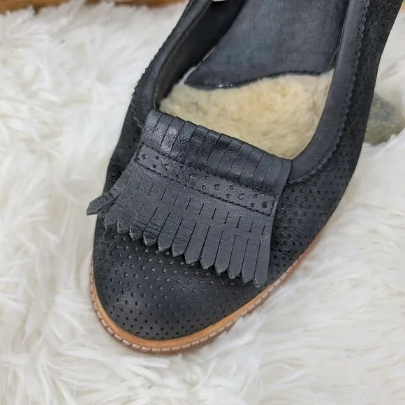 Ugg tasseled leather loafers.  Black