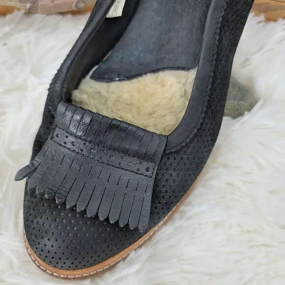 Ugg tasseled leather loafers.  Black