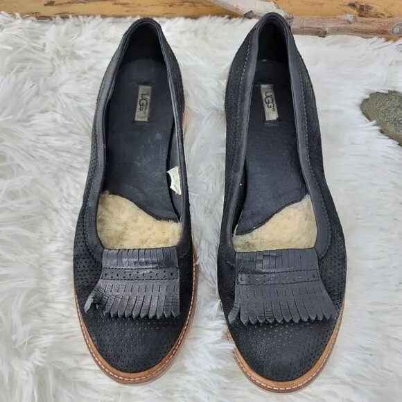 Ugg tasseled leather loafers.  Black