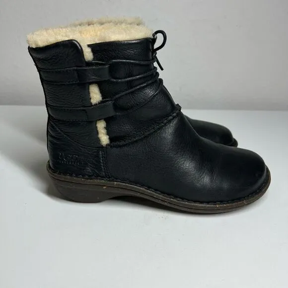 Ugg black leather fur lined tie around winter boots. Size 6
