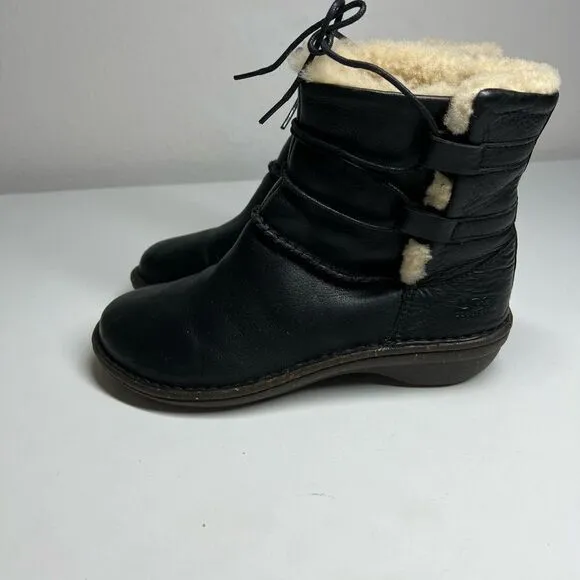 Ugg black leather fur lined tie around winter boots. Size 6