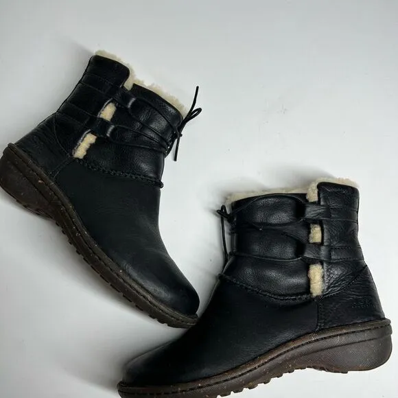 Ugg black leather fur lined tie around winter boots. Size 6