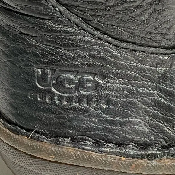 Ugg black leather fur lined tie around winter boots. Size 6