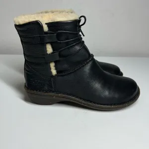 Ugg black leather fur lined tie around winter boots. Size 6