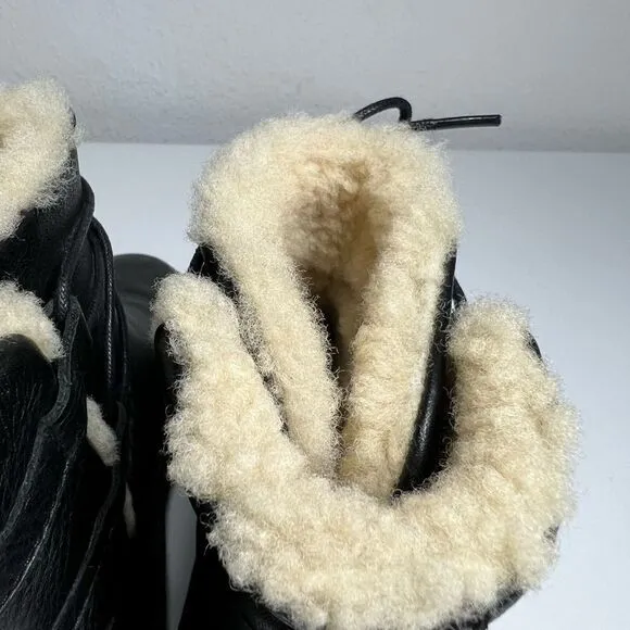 Ugg black leather fur lined tie around winter boots. Size 6