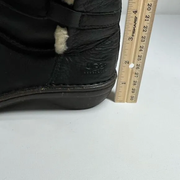 Ugg black leather fur lined tie around winter boots. Size 6