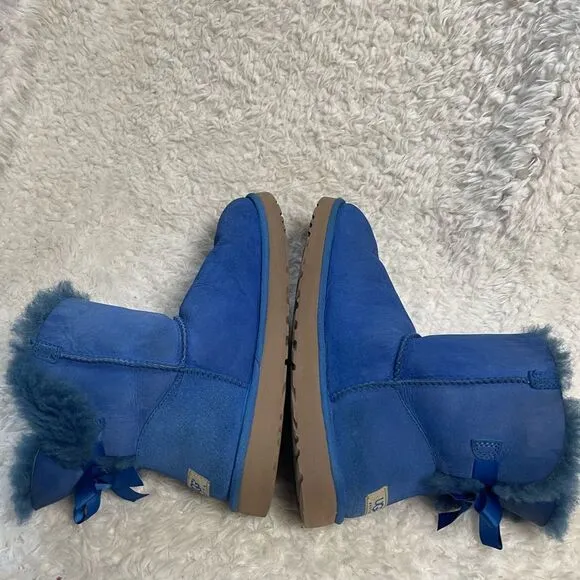 UGG women’s Royal Blue Sheepskin slip on Boots bow accent fur lining SZ10