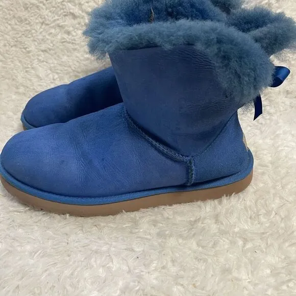 UGG women’s Royal Blue Sheepskin slip on Boots bow accent fur lining SZ10