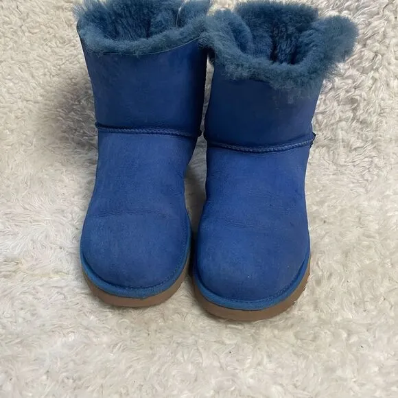 UGG women’s Royal Blue Sheepskin slip on Boots bow accent fur lining SZ10