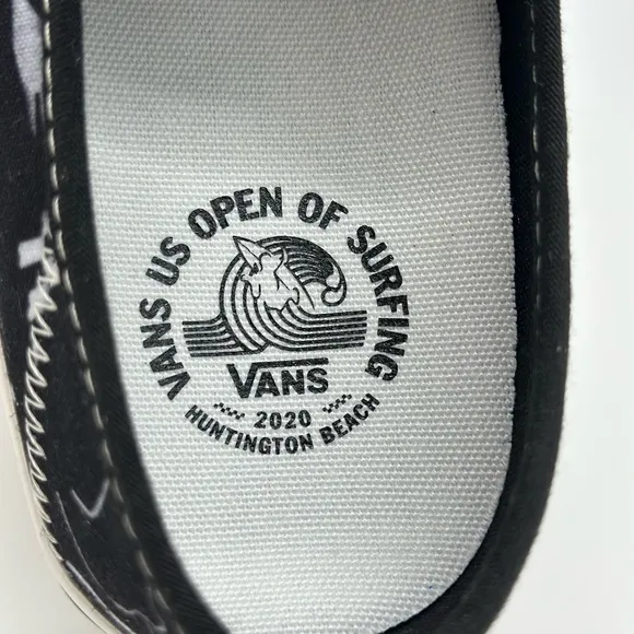 Vans Black and White Slip-On Sneakers with Graphic Design