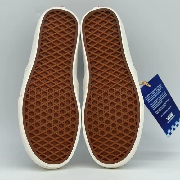 Vans Black and White Slip-On Sneakers with Graphic Design