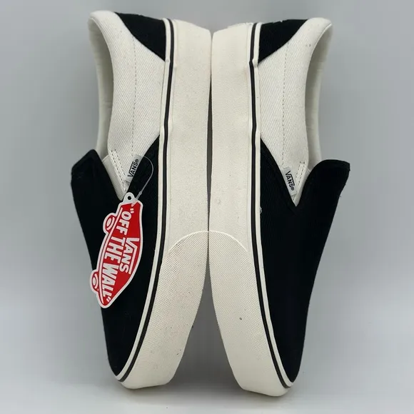 Vans Black and White Slip-On Sneakers