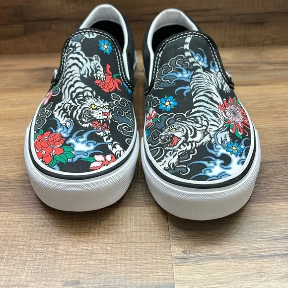 Vans Black Slip-On Sneakers with Colorful Floral Design