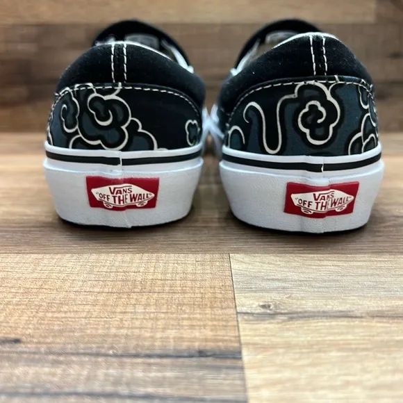Vans Black Slip-On Sneakers with Colorful Floral Design