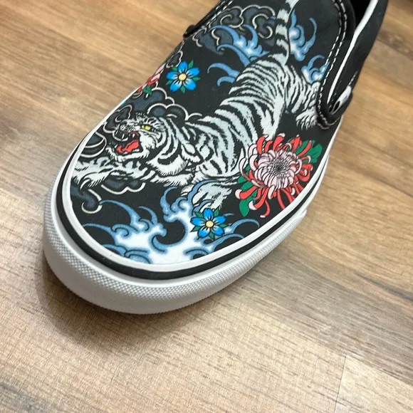 Vans Black Slip-On Sneakers with Colorful Floral Design