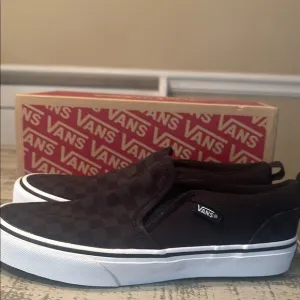 Vans Black Slip-On Sneakers