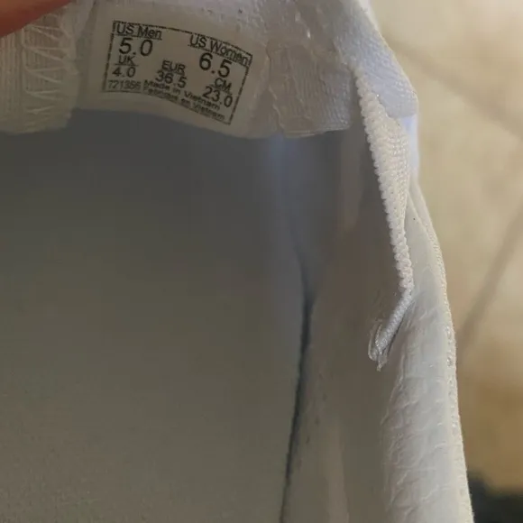 Vans White Slip-On Sneakers